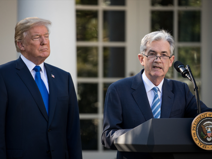 President Donald Trump looks on as his nominee for the chairman of the Federal Reserve Jer