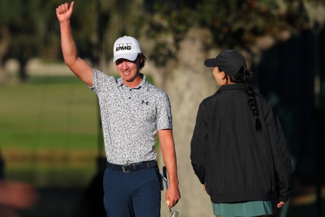 American Maverick McNealy celebrates after sinking a birdie putt on the 18th hole to win t