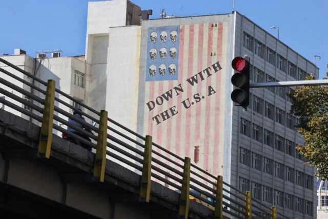 A large anti-US mural painted on the wall of a building in central Tehran