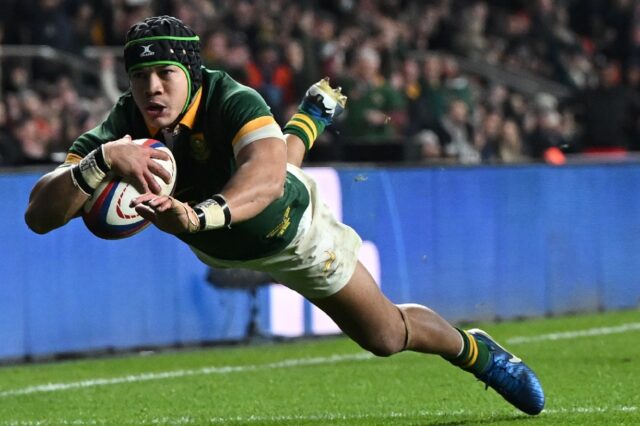 At the double: South Africa wing Cheslin Kolbe scores his second try against England at Tw