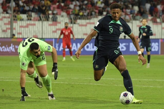 Australia forward Kusini Yengi scores his first goal against Bahrain