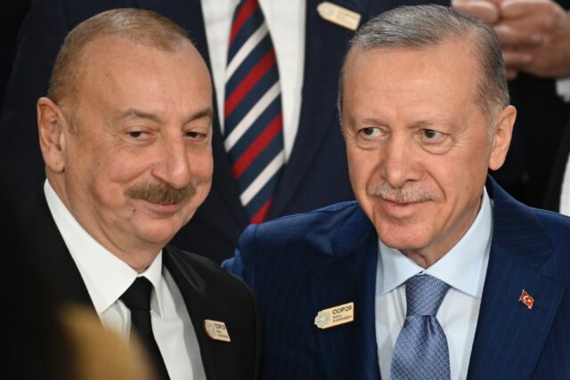 Azerbaijan President Ilham Aliyev (L), pictured with ally and president of Turkey Recep Ta