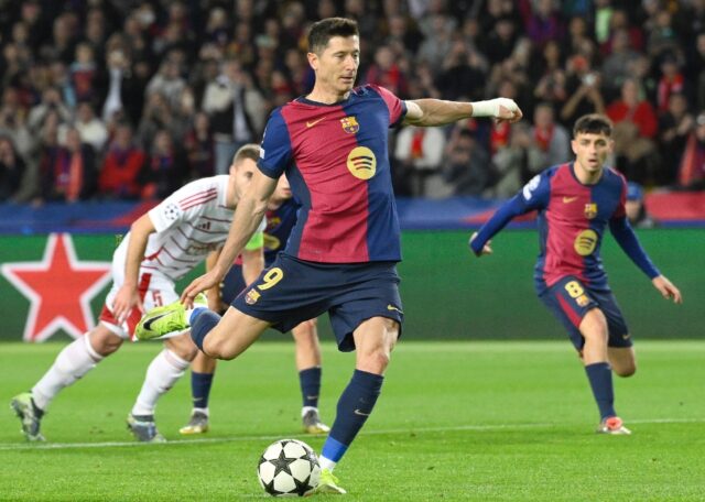 Barcelona's Polish forward Robert Lewandowski scores his 100th Champions League goal from