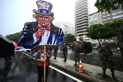 A cardboard cutout of Donald Trump as Uncle Sam at a march in support of the Palestinian p