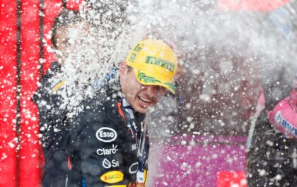 Champagne moment: Max Verstappen celebrates victory on the podium