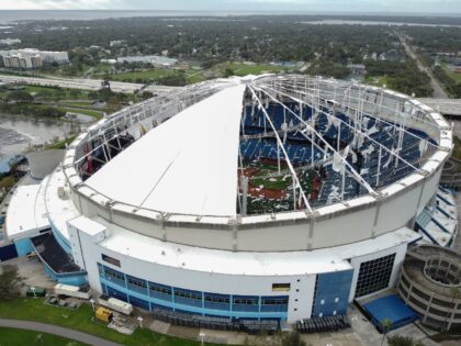 A drone image shows the dome of Tropicana Field which has been torn open due to Hurricane