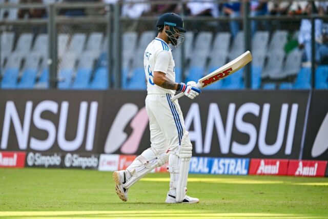 India's Virat Kohli walks back to the pavilion after his dismissal in the third Test