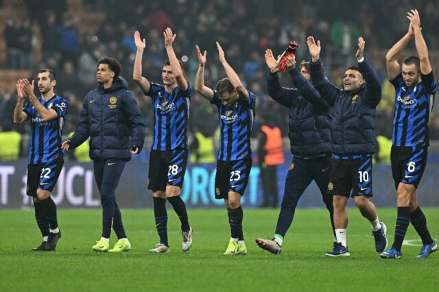 Inter Milan's players celebrate with their fans after Wednesday's win over Arsenal