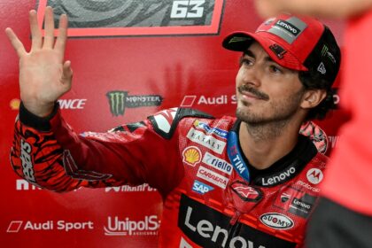 Italian rider Francesco Bagnaia waves in the garage in Sepang