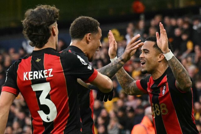 Justin Kluivert (right) scored a hat-trick of penalties for Bournemouth at Wolves