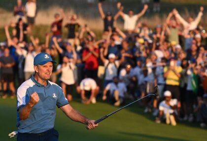 Justin Rose celebrates holing a putt during the 2023 Ryder Cup in Rome