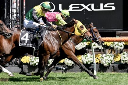 Knight's Choice (right) ridden by Irish jockey Robbie Dolan wins the Melbourne Cup to pip