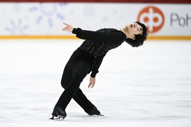 Leaning man: Japan's Yuma Kagiyama in action at the Finlandia Trophy on Friday