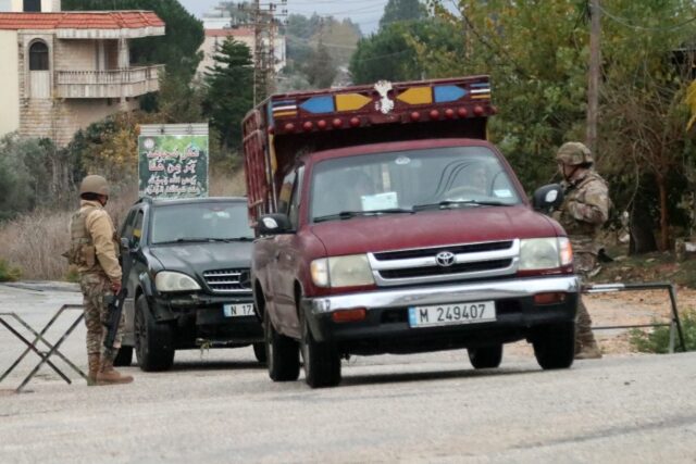 Lebanese army soldiers man a checkpoint in southern Lebanon's Marjayoun area after a cease