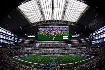 A metal panel fell from the roof of the Dallas Cowboys' AT&T Stadium after it was opened a