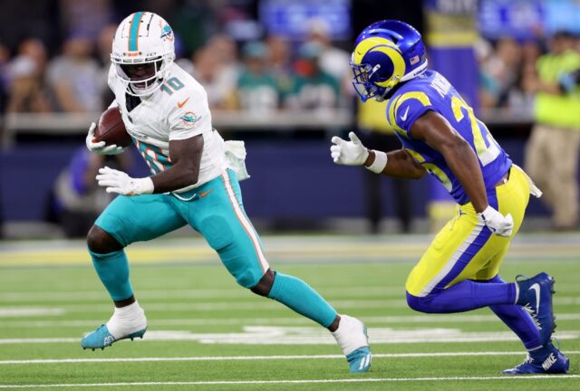 Miami receiver Tyreek Hill eludes the Los Angeles defense during the Dolphins 23-15 win