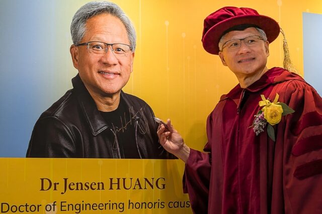 Nvidia CEO Jensen Huang poses for a photo after receiving an honorary doctorate in enginee