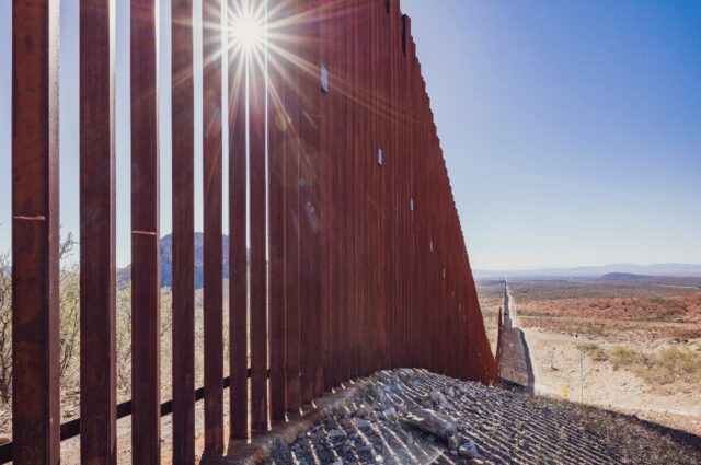 Part of the border wall built under Donald Trump's administration is seen at the US-Medica