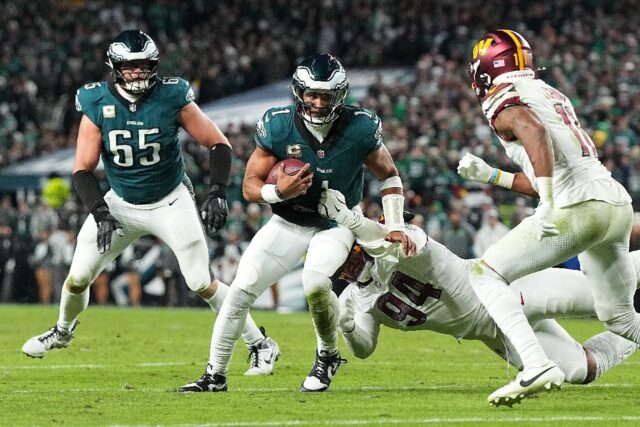 Philadelphia quarterback Jalen Hurts sparked a fourth-quarter rally in the Eagles 26-18 wi