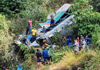 Photographs released by government rescue teams showed the crumpled wreckage of the bus in