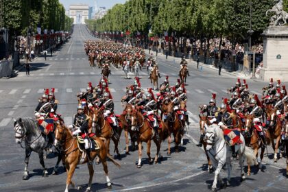 Republican Guard cavalry on parade during Bastille Day celebrations on the Champs-Elysees