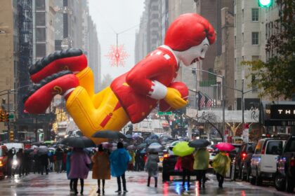 A Ronald McDonald balloon floats during the annual Macy's Thanksgiving Day Parade in New Y