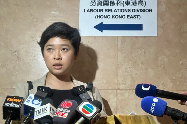 Selina Cheng, head of the Hong Kong Journalists Association (HKJA), speaks to the media in