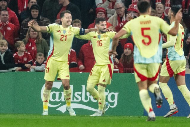 Spain forward Mikel Oyarzabal (L) celebrates scoring his team's first goal against Denmark