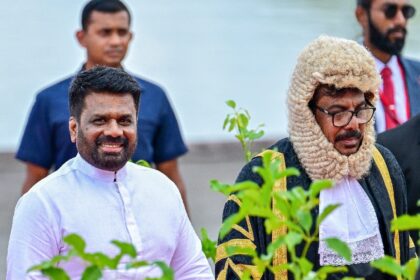 Sri Lanka's President Anura Kumara Dissanayake (L) and Speaker Ashoka Ranwala arrive for t