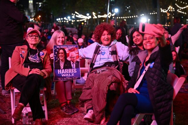 Supporters gather ahead of a star-studded rally for Kamala Harris featuring Lady Gaga and