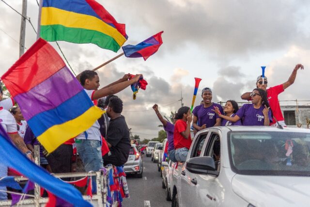 Supporters of Navin Ramgoolam's alliance celebrate in Mauritius