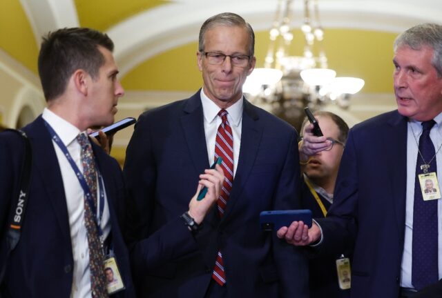 US Sen. John Thune (R-SD) arrives for the Senate Republican leadership elections at the U.