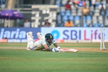 Virat Kohli is being run out by New Zealand's Matt Henry as India struggled on a gripping