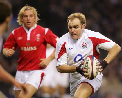 Former Wales flanker Alix Popham (L) wants the new chairman of World Rugby to implement me