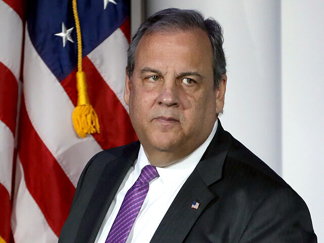 Former New Jersey Governor Chris Christie speaking with attendees at the Republican Jewish