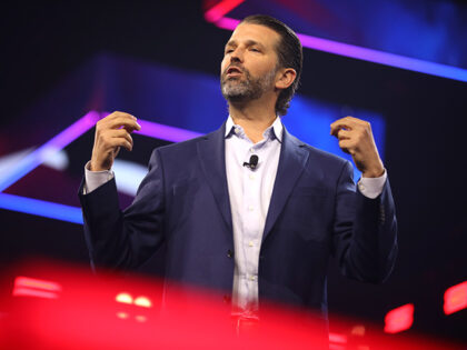 Donald Trump, Jr. speaking with attendees at the 2023 AmericaFest at the Phoenix Conventio