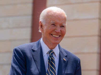 President Joe Biden and President Joao Lourenco pose for an official photo during an arriv