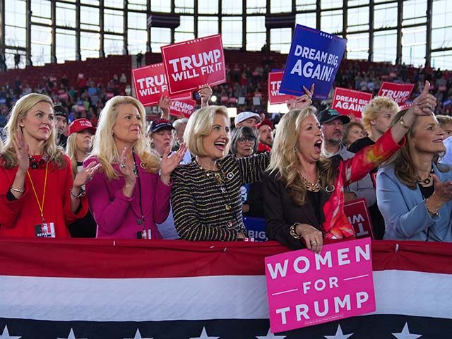 Supporters get ready before Republican presidential nominee former President Donald Trump