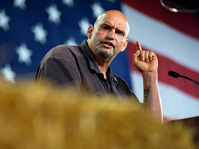 Sen. John Fetterman, D-Pa., speaks ahead of Democratic vice presidential candidate Minneso