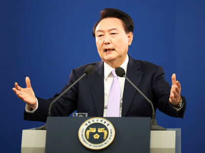 South Korean President Yoon Suk Yeol answers a reporter's question during a news conferenc