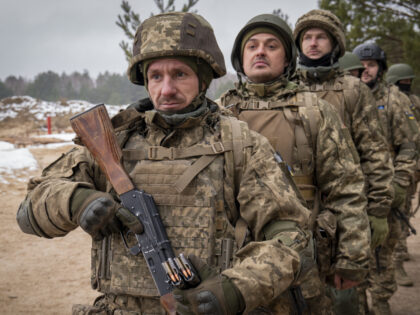 New recruits practice on a military training ground in Chernihiv region, Ukraine, Thursday