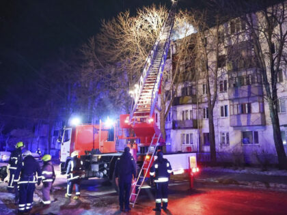 In this photo provided by the Ukrainian Emergency Service, firefighters work on the site o