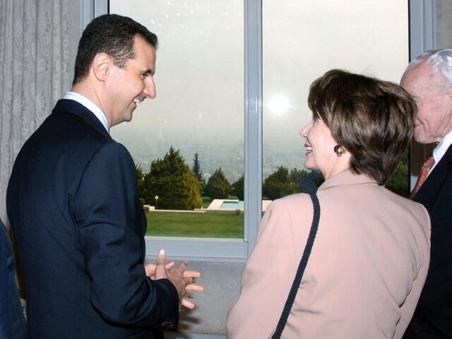 US House Speaker Nancy Pelosi (C) meets with Syrian President Bashar al-Assad (L) at al-Sh