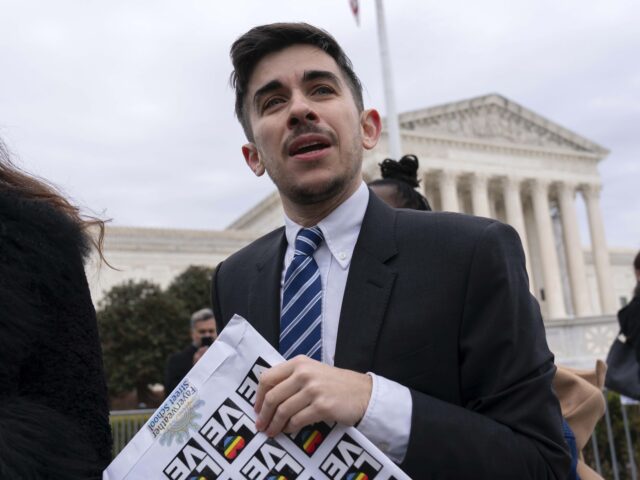 Attorney and transgender rights activist Chase Strangio speaks to supporters outside of th