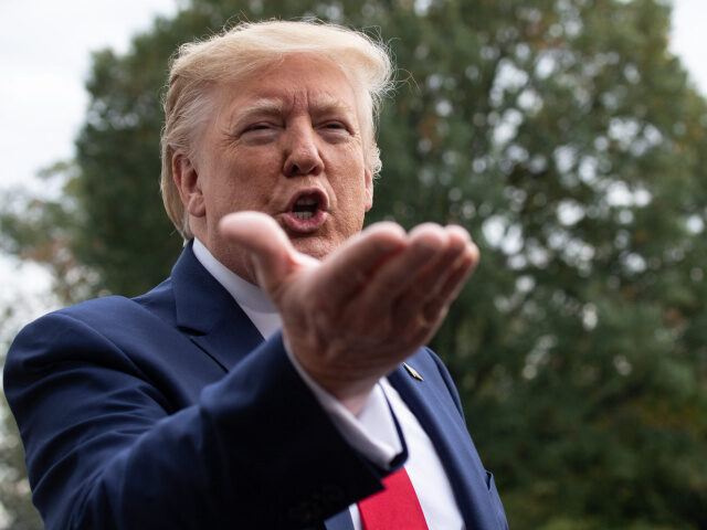 US President Donald Trump speaks to the press before departing the White House in Washingt