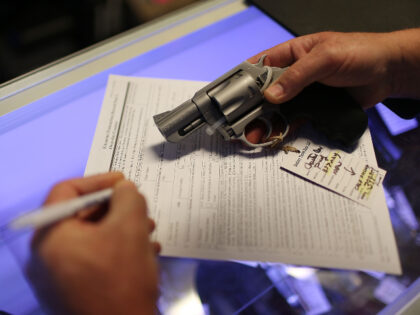 DELRAY BEACH, FL - JANUARY 05: Mark O'Connor fills out his Federal background check p