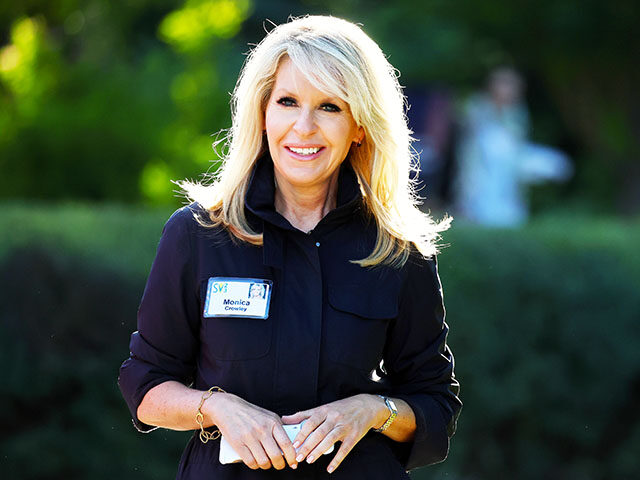 Monica Crowley, former U.S. Assistant Secretary of the Treasury for Public Affairs, walks