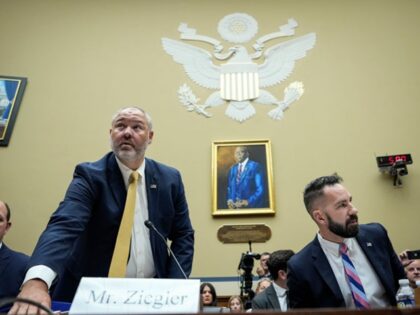 WASHINGTON, DC - JULY 19: Supervisory IRS Special Agent Gary Shapley (L) and IRS Criminal