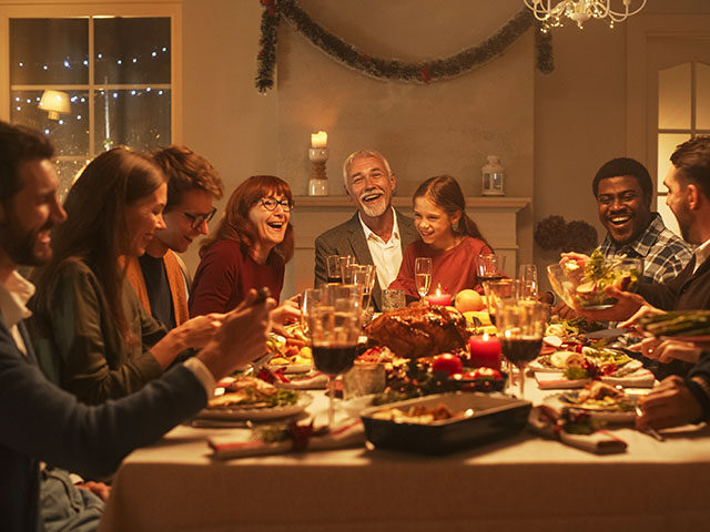 Multi-Generational Family Members Share Funny Stories and Joy During a Christmas Turkey Di