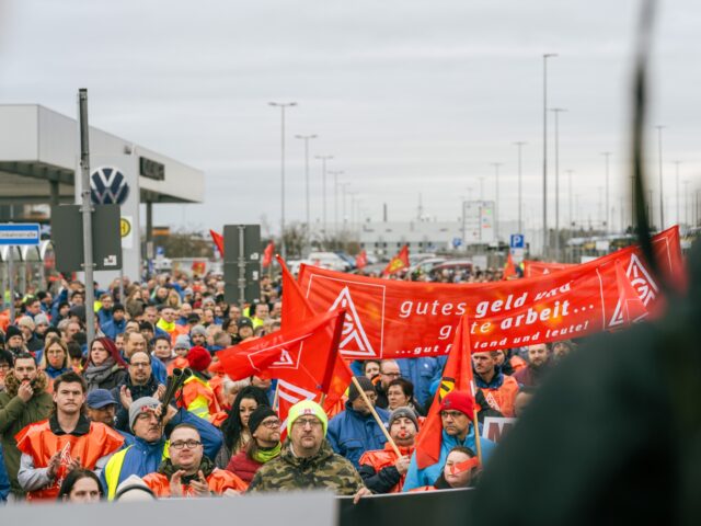 Workers stage a temporary walkout warning strike at the Volkswagen AG factory in Zwickau,